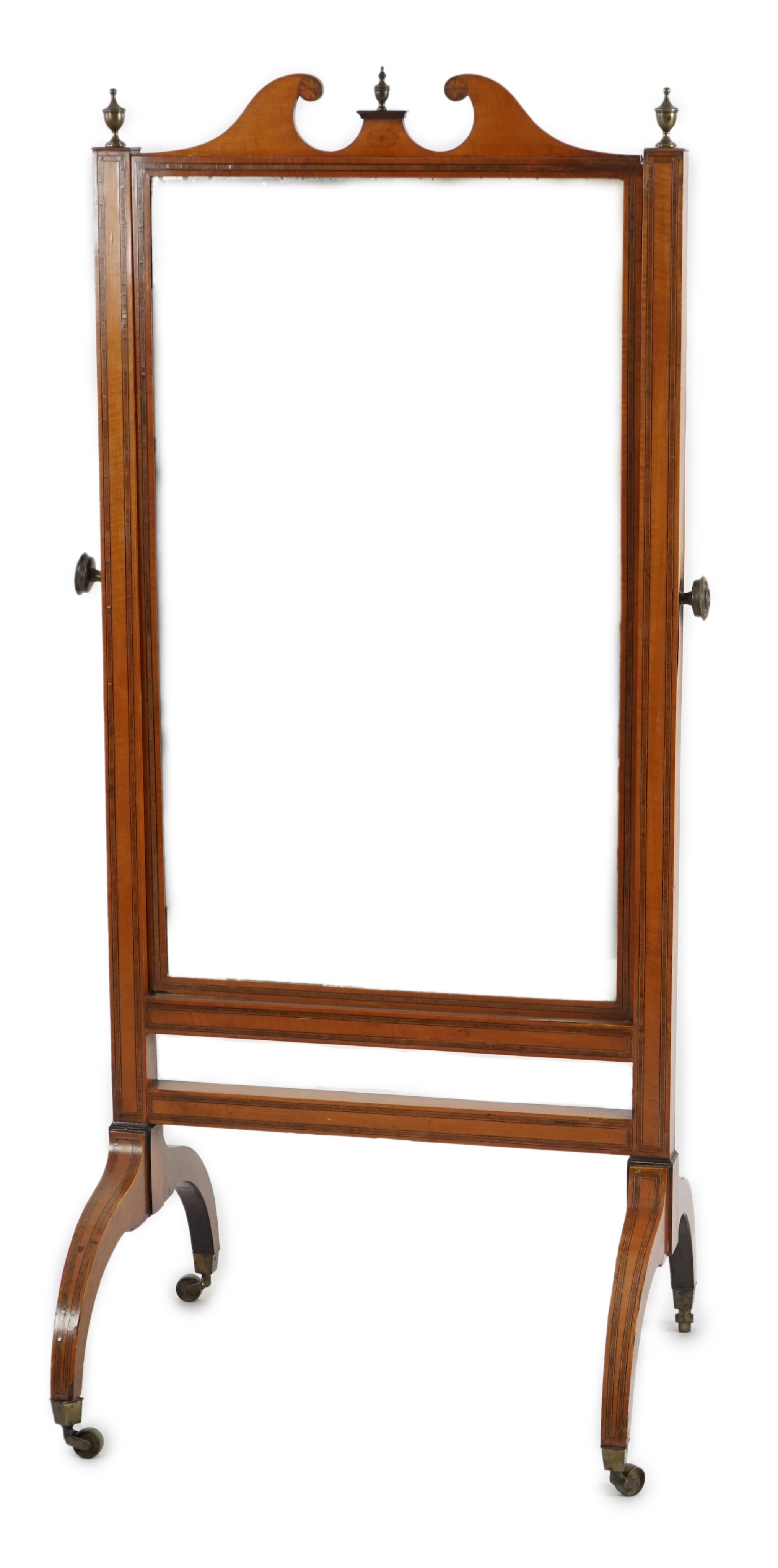 An Edwardian satinwood cheval mirror